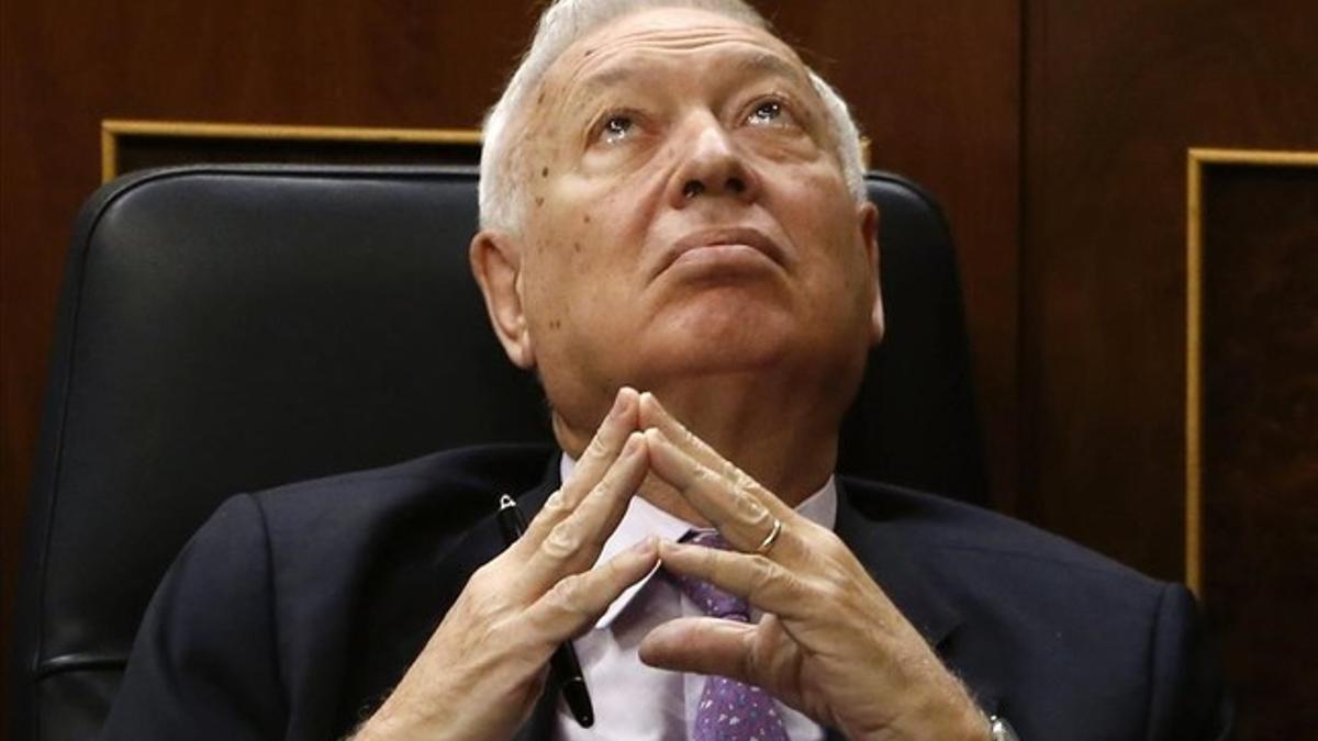 José Manuel García-Margallo, durante la intervención de Pedro Sánchez en el debate de investidura.