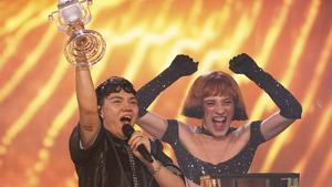 Winner of the Eurovision Song Contest JJ from Austria holds up the trophy onstage, he won with the song Wasted Love during the Grand Final of the 69th Eurovision Song Contest, in Basel, Switzerland, Saturday, May 17, 2025. (AP Photo/Martin Meissner)