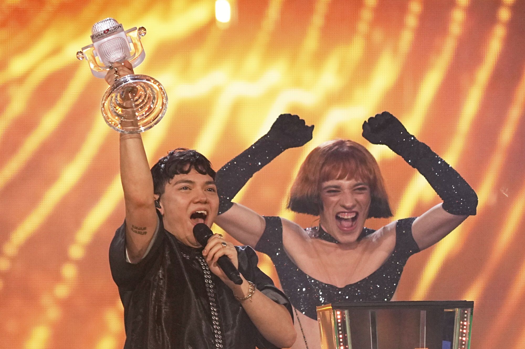Winner of the Eurovision Song Contest JJ from Austria holds up the trophy onstage, he won with the song &quot;Wasted Love&quot; during the Grand Final of the 69th Eurovision Song Contest, in Basel, Switzerland, Saturday, May 17, 2025. (AP Photo/Martin Meissner)