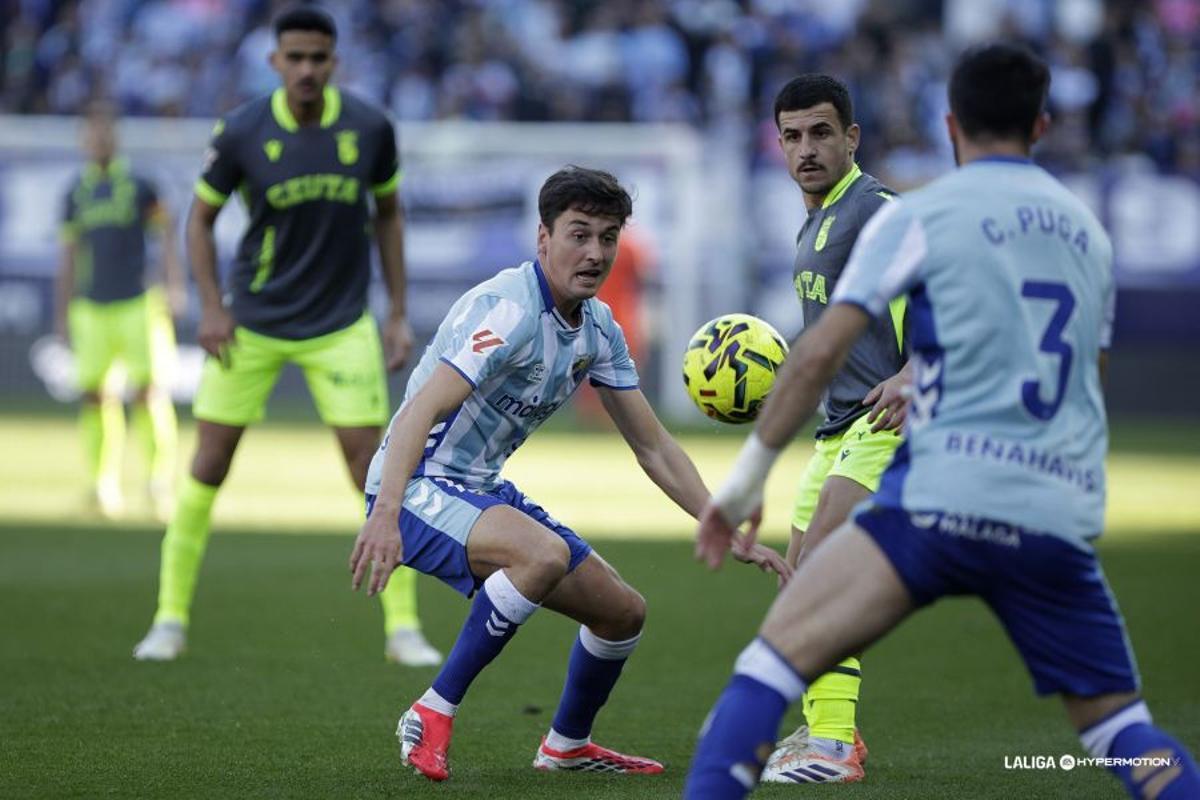 Dotor y Puga, durante el partido.