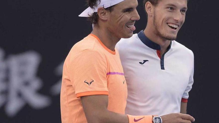 Rafa Nadal y Pablo Carreño celebran su victoria en Pekín ante los chinos Mao Xin y Zhang Ze.