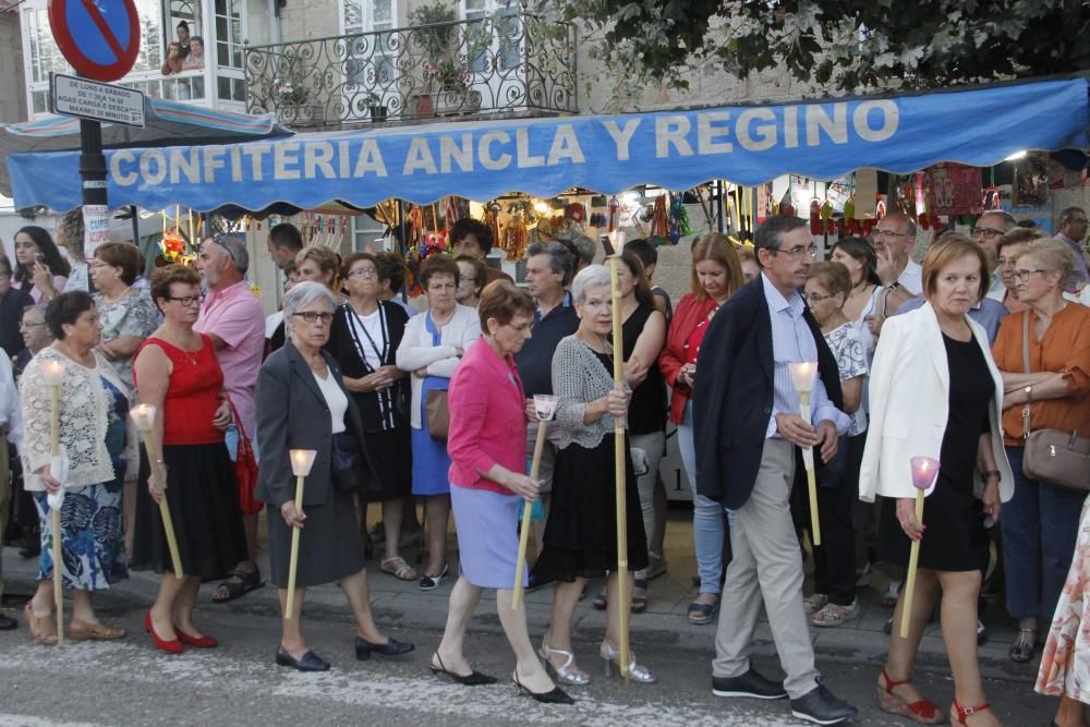 Un Cristo entre el fervor de la multitud. // Santos Álvarez