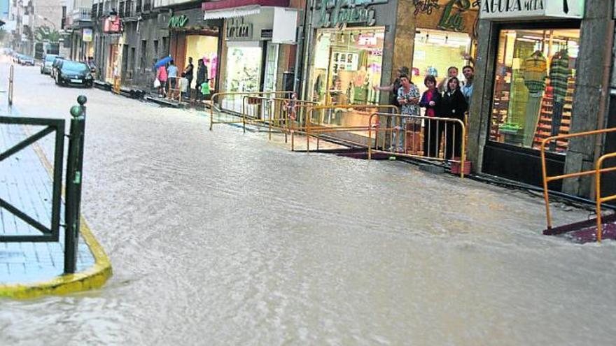 Inundaciones en la calle Emilio Castelar de Novelda.