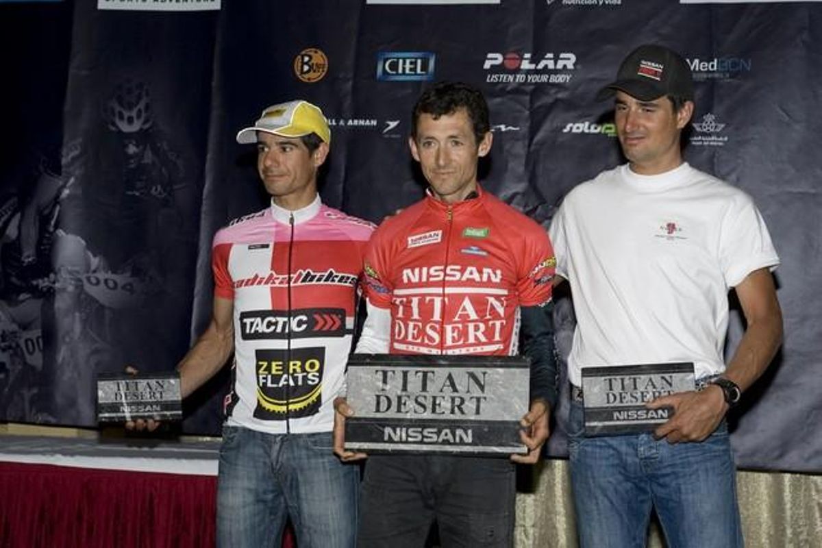 El podi masculí del 2010: En primer lloc (centre) l’exciclista professional Roberto Heras. En segon lloc (dreta) el txec Ondrej Fojtik, que va ser líder de la general després de guanyar la segona etapa. I en tercer lloc, el gironí Marc Trayter, vencedor de l’última etapa. A les portes del podi es quedava Israel Nuñez, guanyador de l’edició anterior.