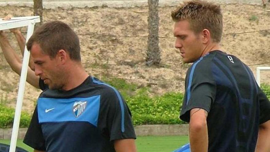 Duda y Kris, en un entrenamiento de ayer.