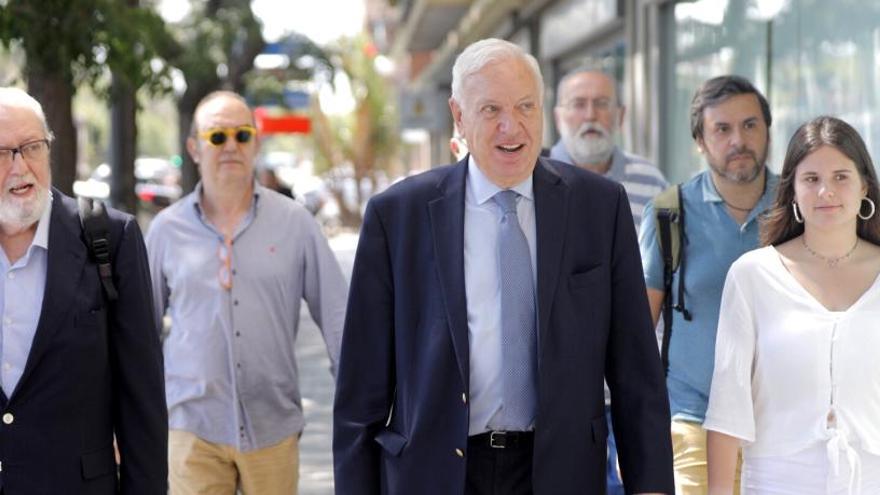 Margallo a su llegada a la sede del PP en València