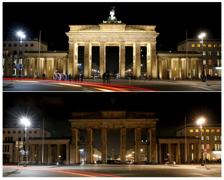 The Brandenburger Tor gate is seen before and ...