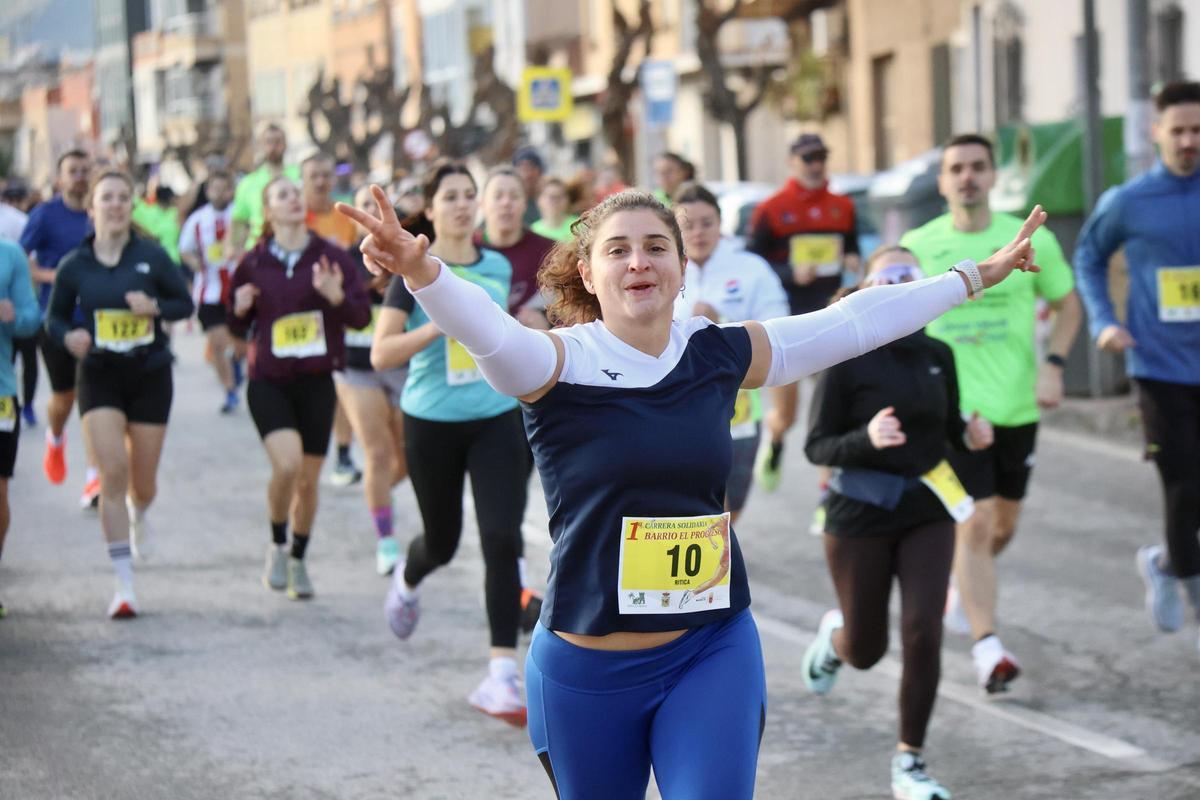 Las imágenes de la carrera popular solidaria en el barrio de El Progreso
