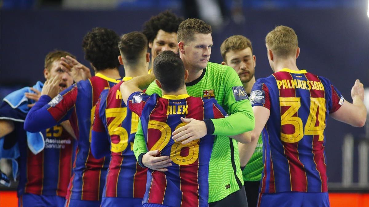 Handball - EHF FINAL4 Men s Handball Champions League - Semi Final - FC Barcelona HB v Paris St Germain Handball - Lanxess Arena  Cologne  Germany - December 28  2020 Barcelona s Kevin Moeller  Alex Pascual Garcia and teammates celebrate after the match REUTERS Thilo Schmuelgen