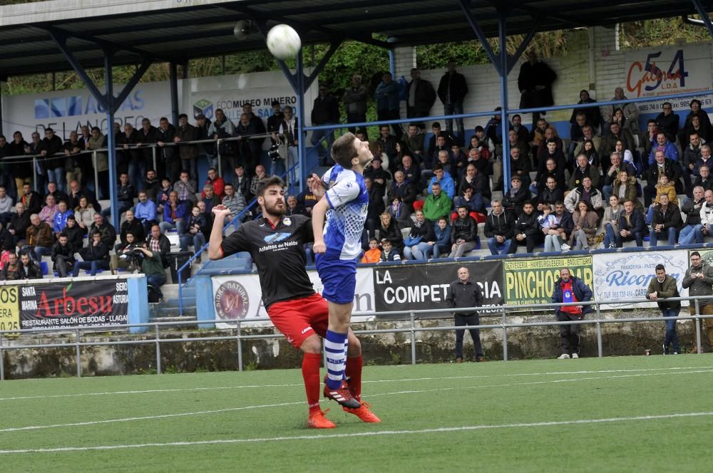 El partido entre el Tuilla y el Langreo, en imágenes