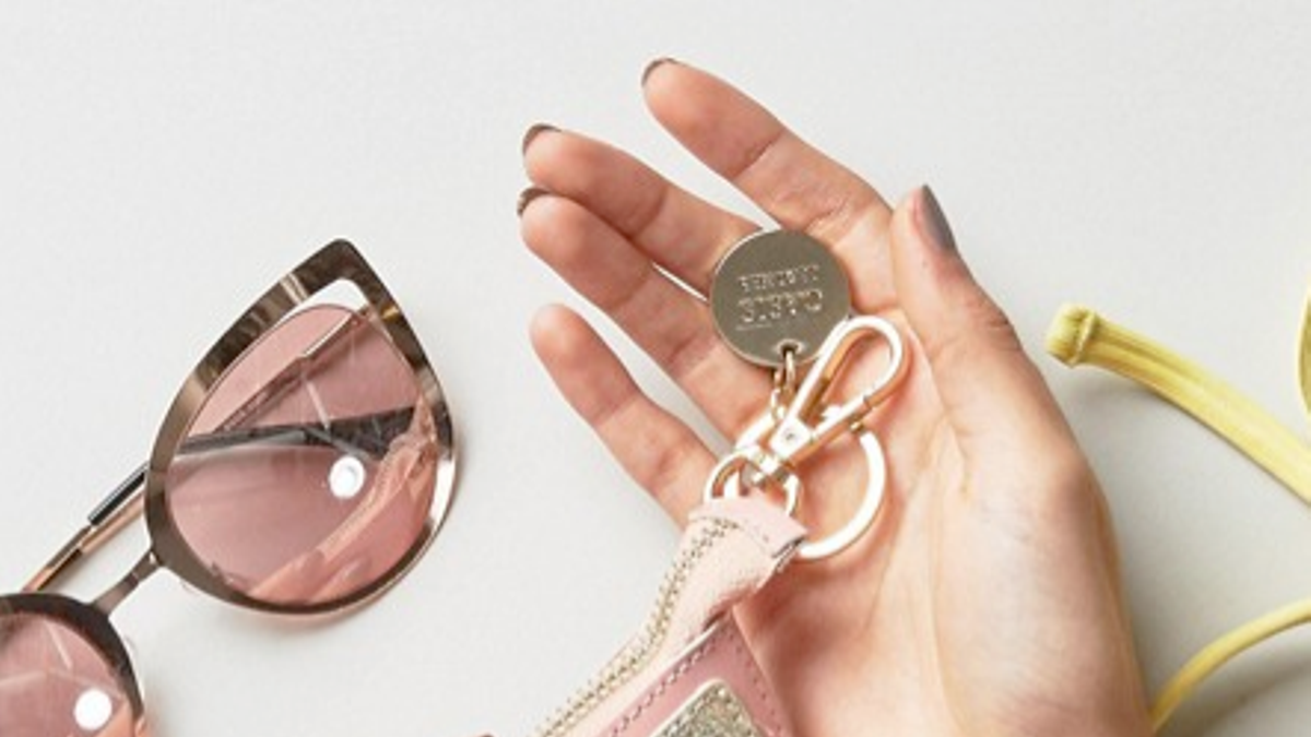 Cartera con forma de mango de Asos