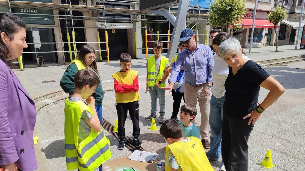 Acto de concienciación de los alumnos del  club de ciencia del IES  Johan Carballeira