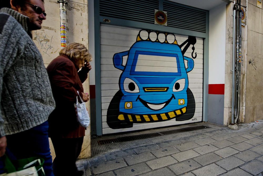 Grafitis en comercios y garajes de Alicante