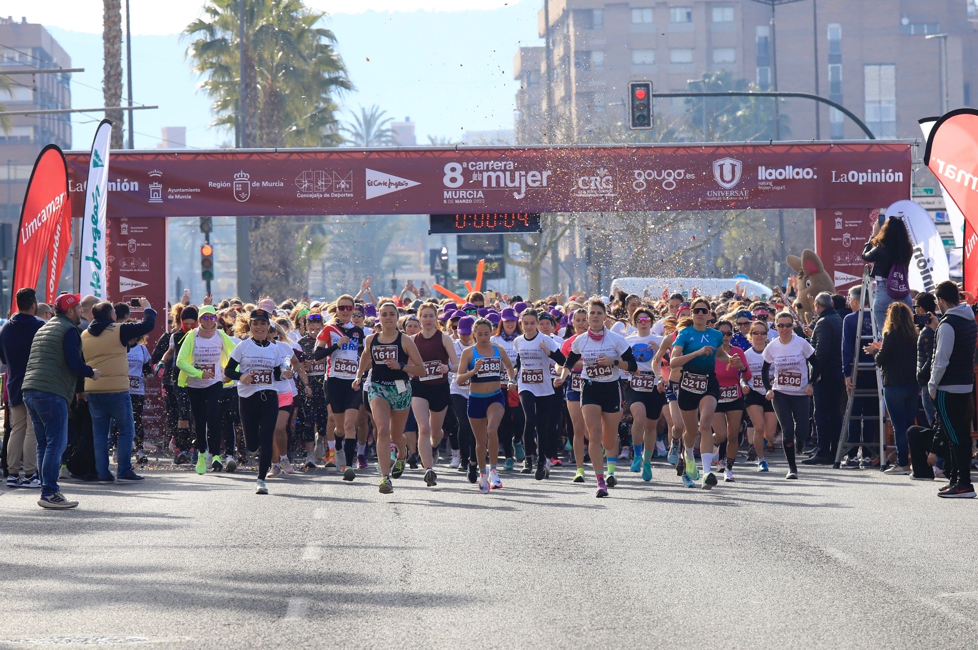 La salida y el recorrido de la Carrera de la Mujer 'inmortalizados' en imágenes