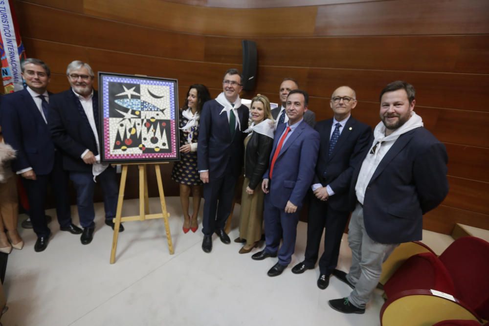 Presentación del cartel del Entierro de la Sardina y posterior reparto de pasteles de carne