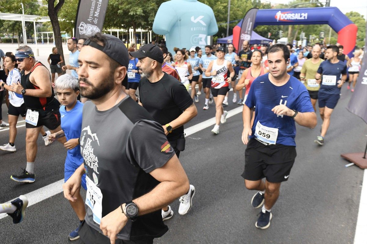 La carrera y marcha Solidaria Asteamur, en imágenes