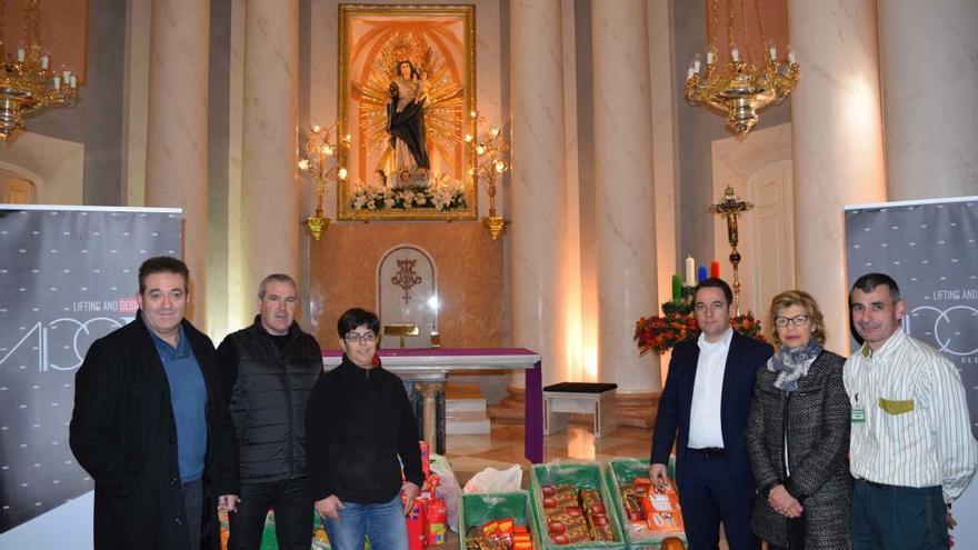 Alimentos para Cáritas por cada ascensor montado