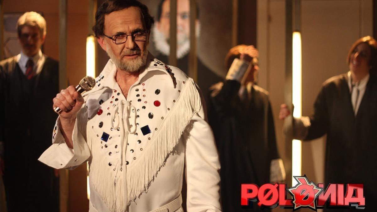 Mariano Rajoy (Queco Novell) como Elvis, en Polònia