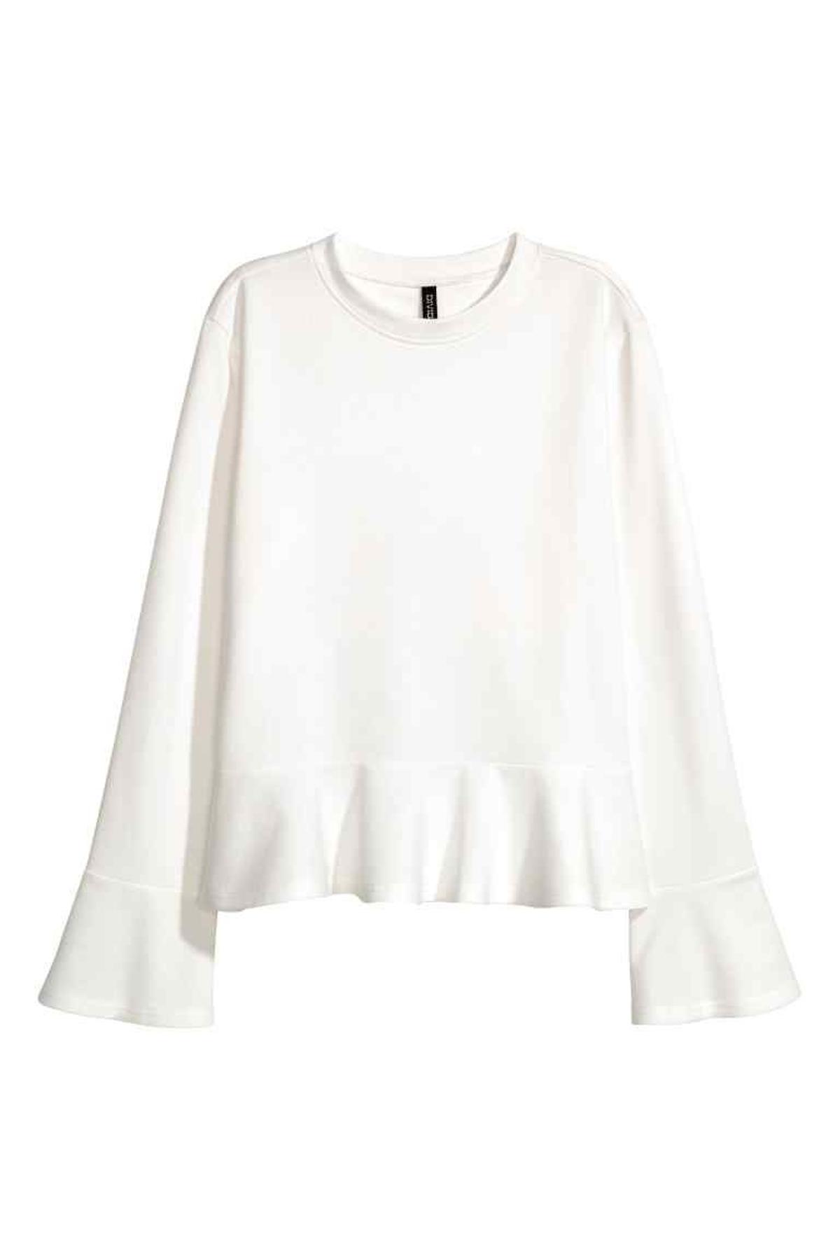 Sudadera mangas campana de H&M (Precio 8.99 euros)
