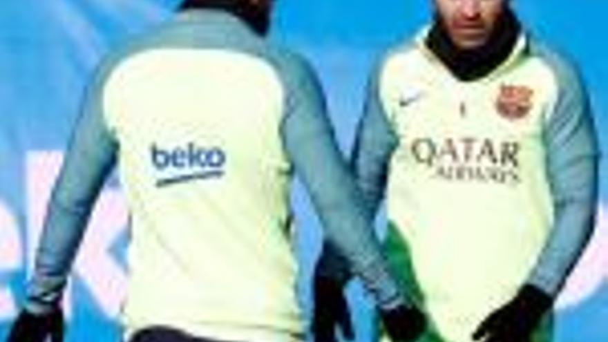 Messi i Iniesta, durant l&#039;entrenament d&#039;ahir.