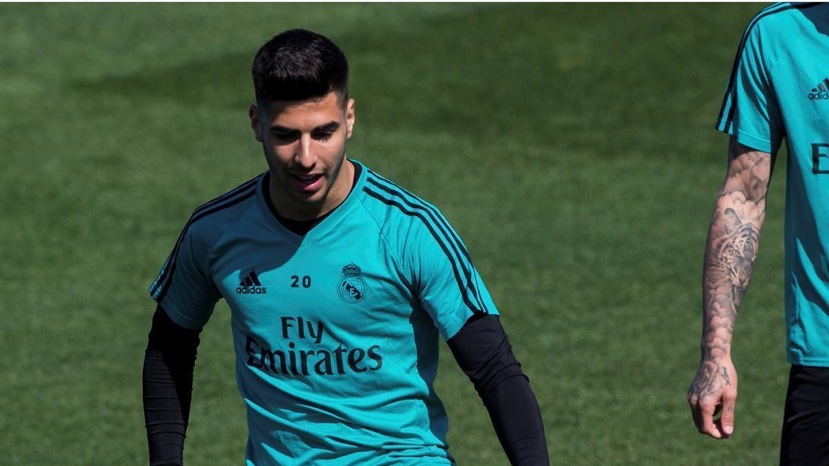 Marco Asensio, durante un entrenamiento con el Real Madrid.