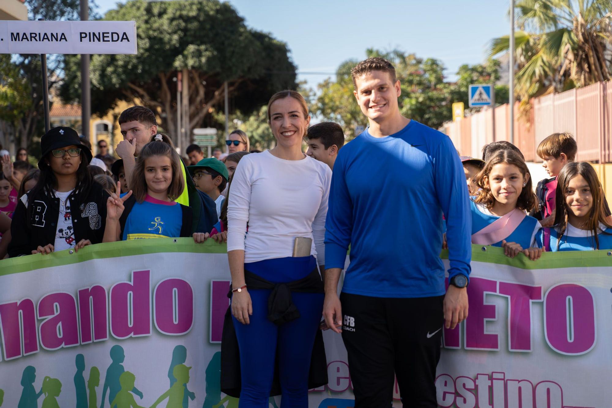 La carrera de Benalmádena 'Caminando por un reto', en imágenes