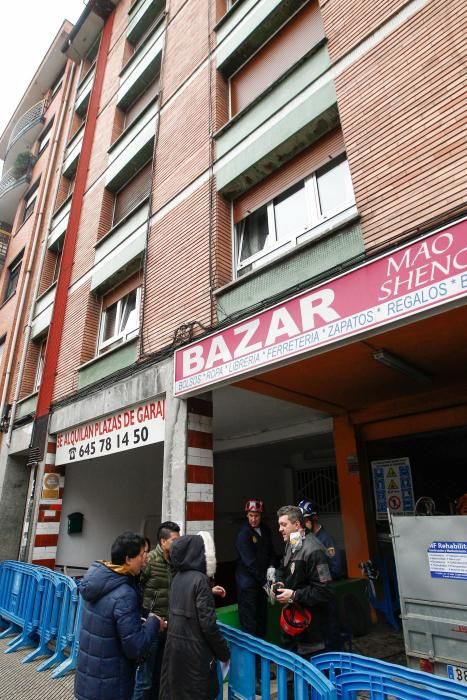 Investigación del incendio de un bazar chino en Pumarín, Oviedo