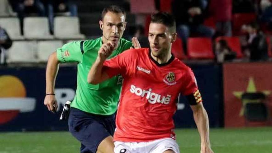 Rocha, en un partido con el Nàstic cuando era capitán.