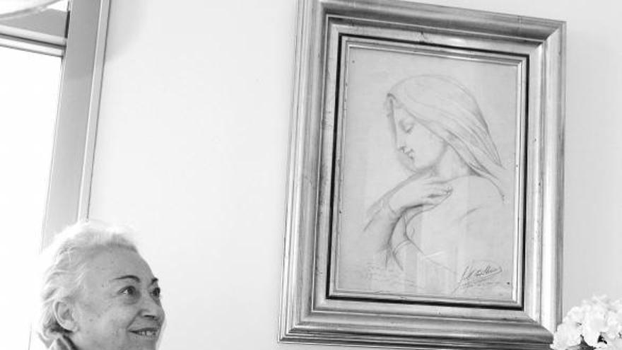 Teresa Ríos Diz, en su casa de Bueu, ante el cuadro de Laxeiro. | // FDV