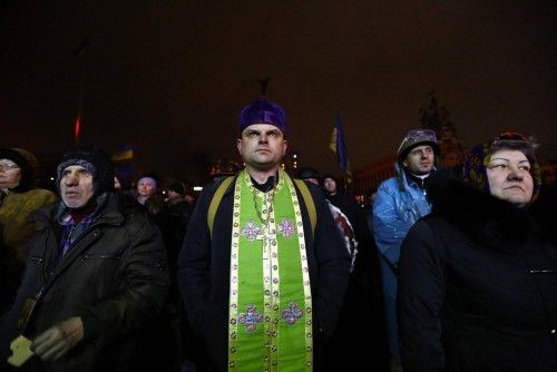 Las calles de Kiev se han despertado con la vista puesta en la evolución de unas protestas que podrían llegar a su fin si prospera el acuerdo entre Yanukovich y la oposición