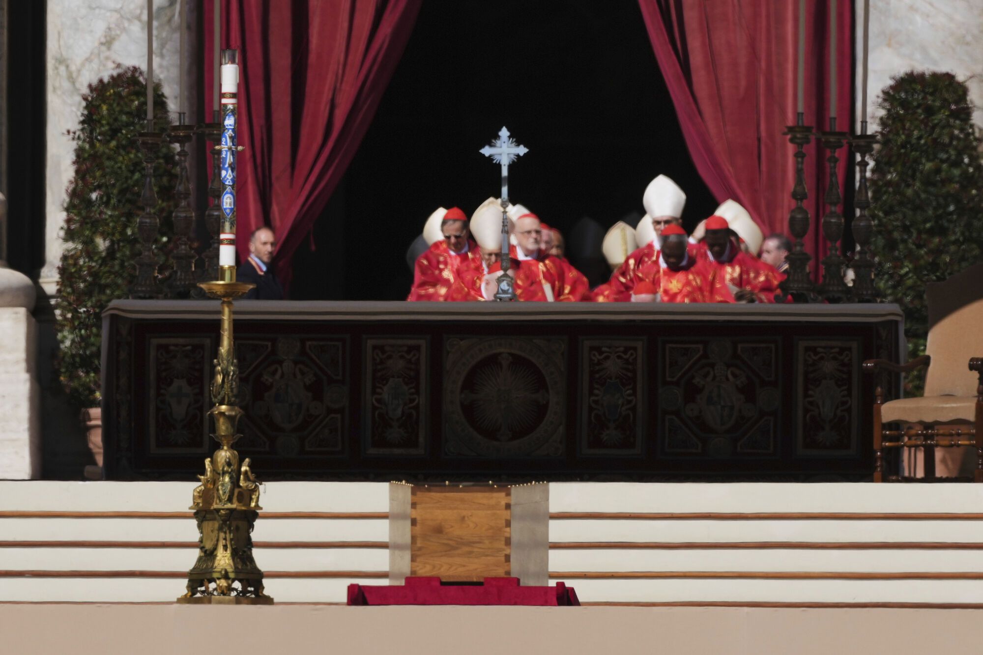 The coffin of Pope Francis is placed on the ground in St Peter's Square for his funeral, at the Vatican, Saturday, April 26, 2025. (AP Photo/Andrew Medichini). EDITORIAL USE ONLY/ONLY ITALY AND SPAIN