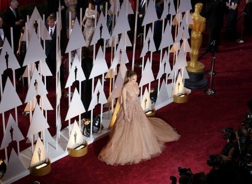 Singer Jennifer Lopez wears a gown by Elie Saab as she arrives at the 87th Academy Awards in Hollywood