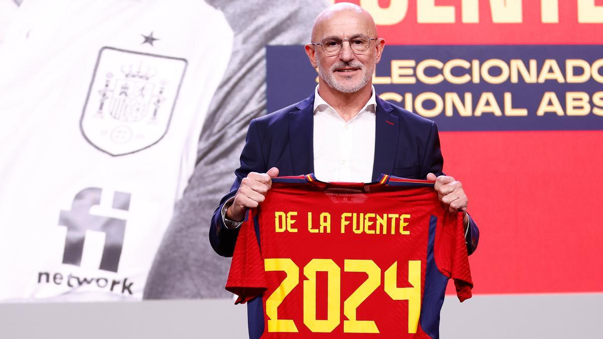 Luis de la Fuente pose for photo with the official T-Shirt during his presentation as new head coach of Spain football team at Ciudad del Futbol on december 12, 2022, in Las Rozas, Madrid, Spain.