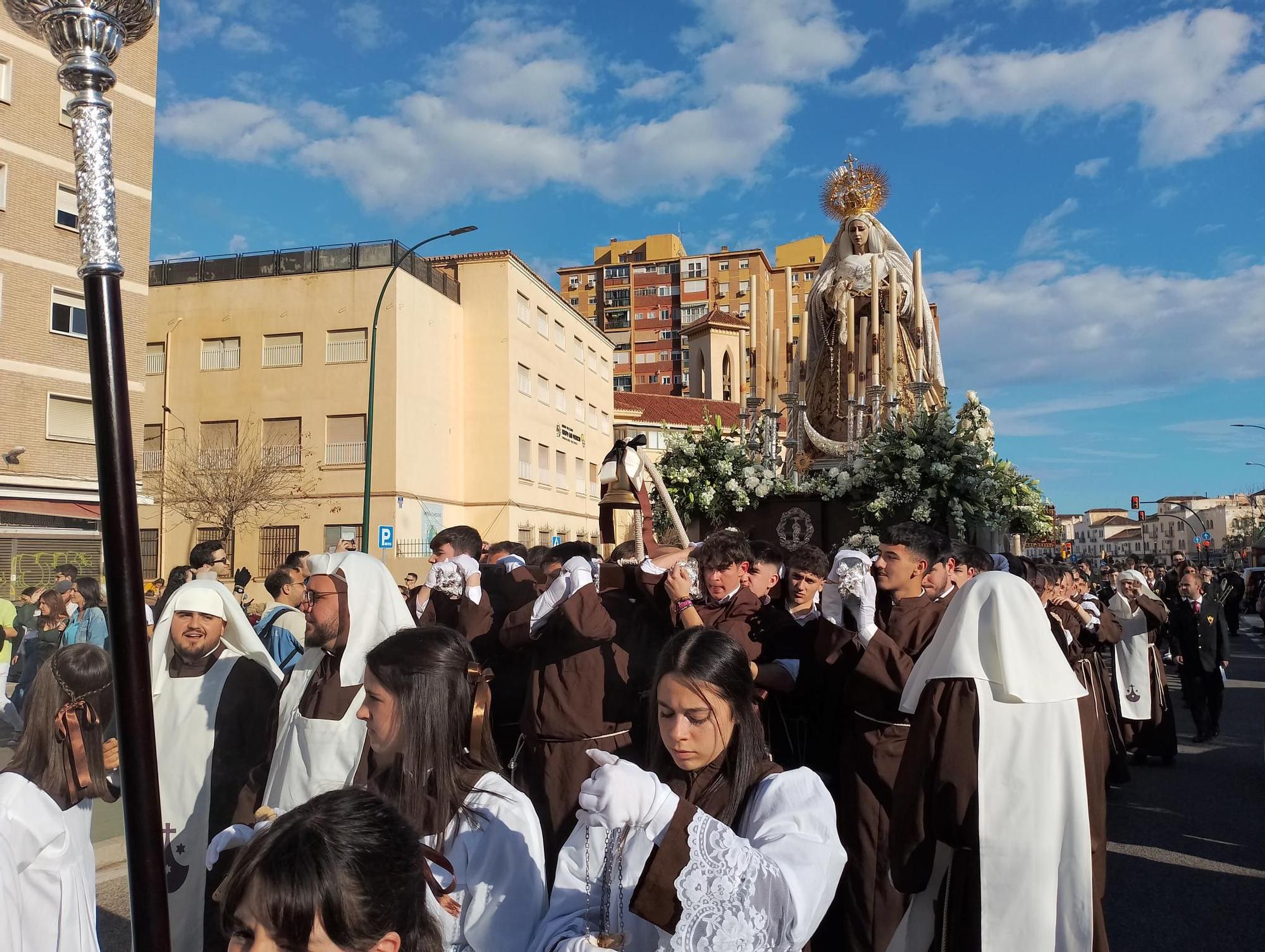 La procesión de la Virgen de Lágrimas del Carmen de Huelin, en imágenes