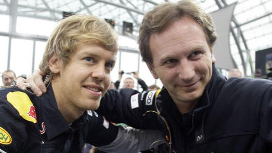 Vettel, con el jefe de Red Bull, Christian Horner.