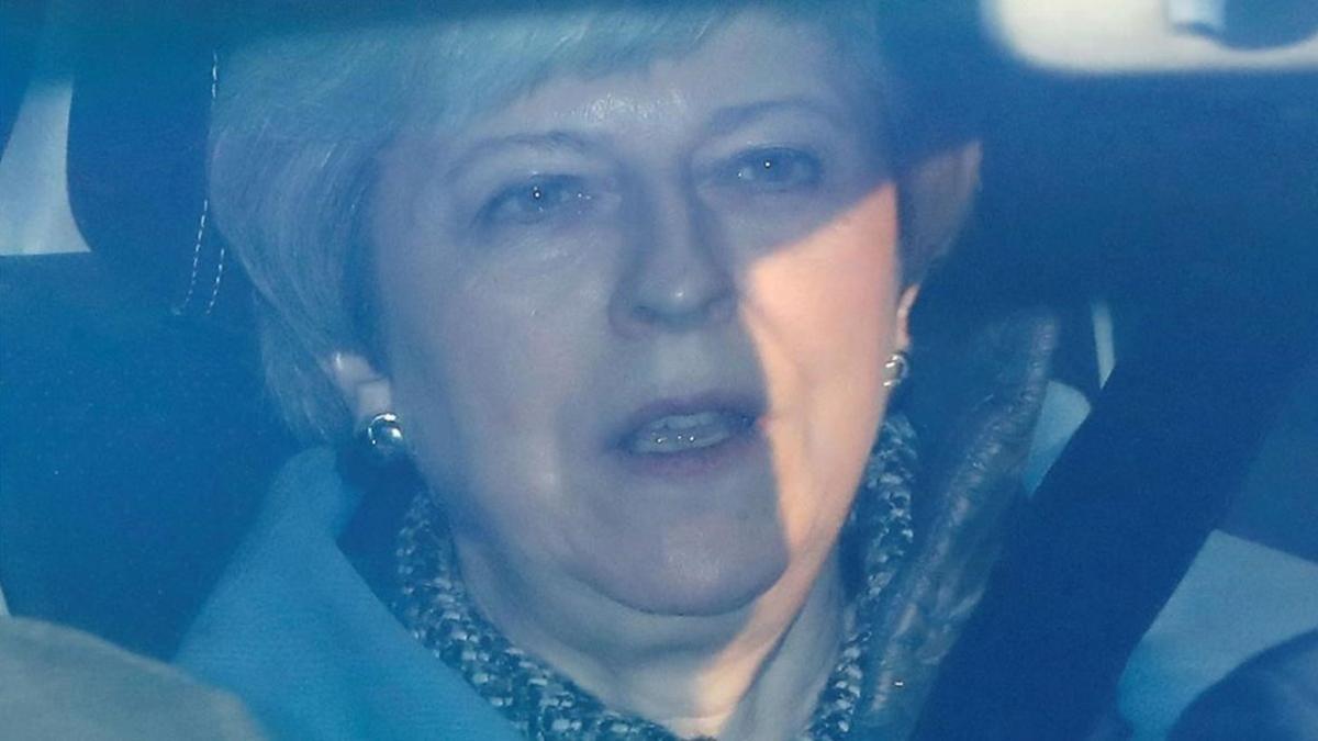 britain s prime minister theresa may  c  leaves from the hou190401225725