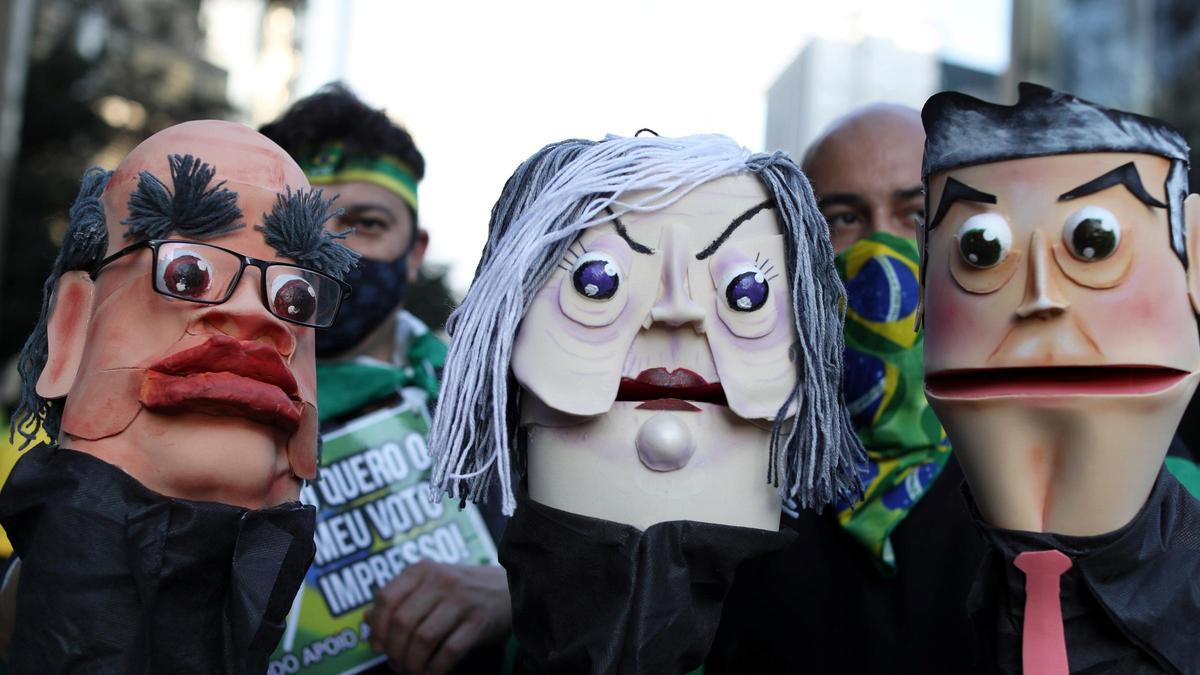 Supporters of Brazilian President Jair Bolsonaro take part in a protest calling for a printed vote, in Paulista Avenue, Sao Paulo