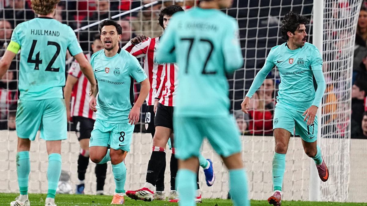 Sporting's Francisco Trincao, right, celebrates scoring his side's 2nd goal during the Champions League opening phase soccer match between Athletic Bilbao and Sporting CP, in Bilbao, Spain, Wednesday, Jan. 28, 2026. (AP Photo/Miguel Oses)