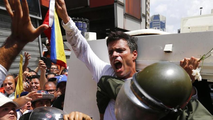 López, en la marcha en la que fue detenido.