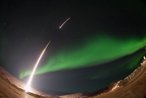 Handout photo of NASA-funded sounding rocket launching into an aurora over Venetie, Alaska