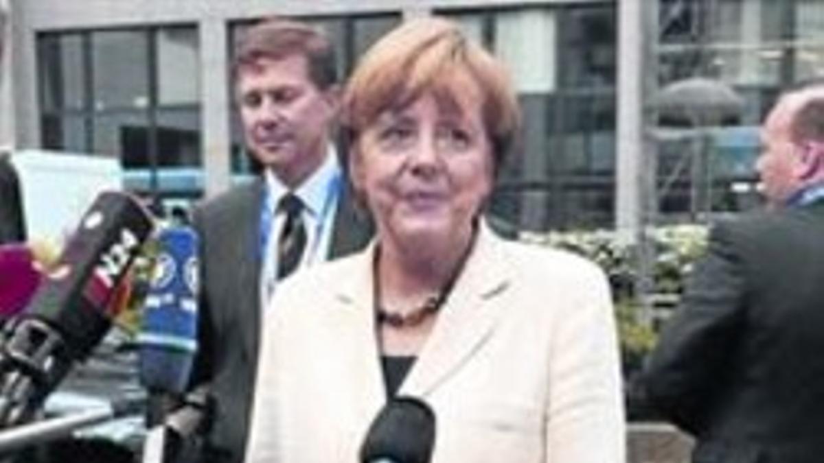 La cancillera Angela Merkel reclama el consenso para elegir al presidente.