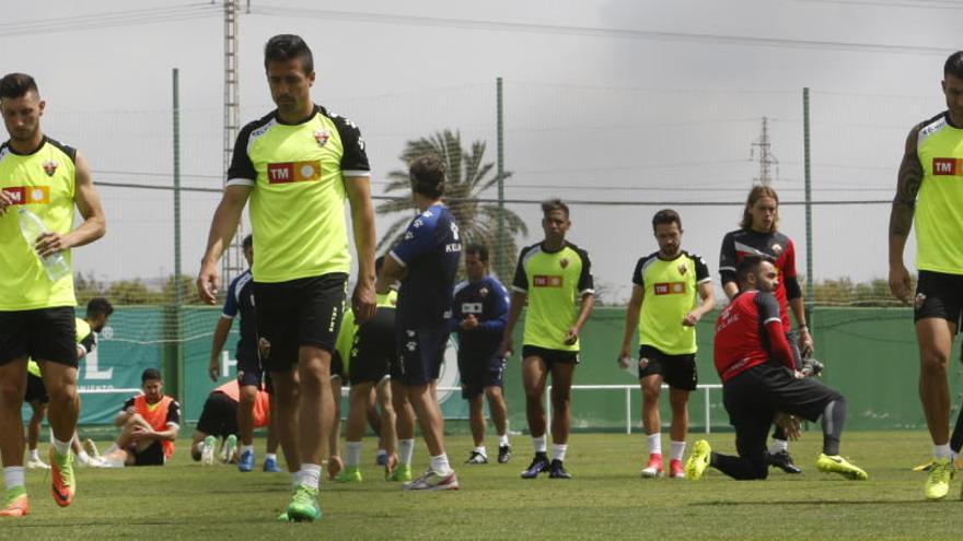 Borja Valle, Pedro y Armando, durante el entrenamiento de esta mañana