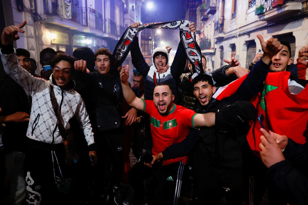 Morocco fans gather to celebrate their teams victory against Spain in Bilbao