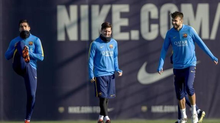 Luis Suárez, Messi y Piqué, en el entrenamiento de ayer.