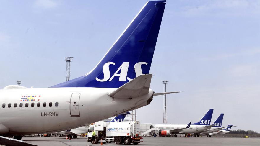 Archivo - Aviones de la aerolínea SAS en el aeropuerto de Estocolmo.