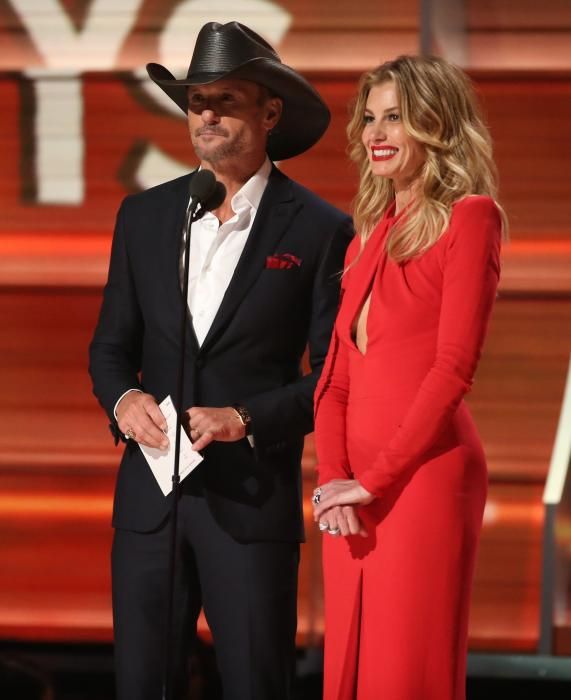 Singers Tim McGraw and Faith Hill present an award at the 59th Annual Grammy Awards in Los Angeles, California, U.S. , February 12, 2017. REUTERS/Lucy Nicholson