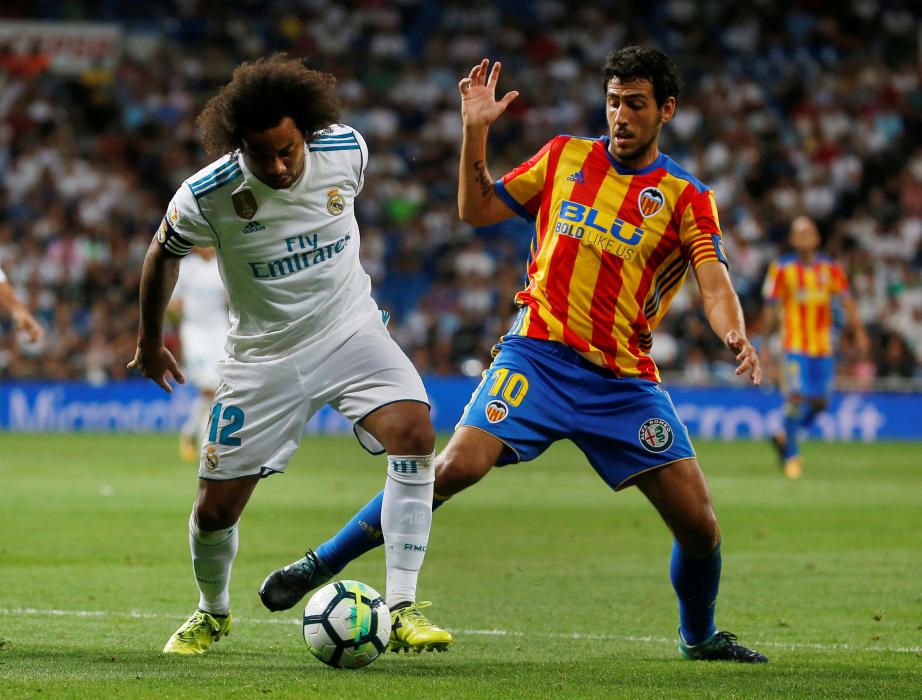 Instantes del partido disputado ayer entre el Valencia CF y el Real Madrid.