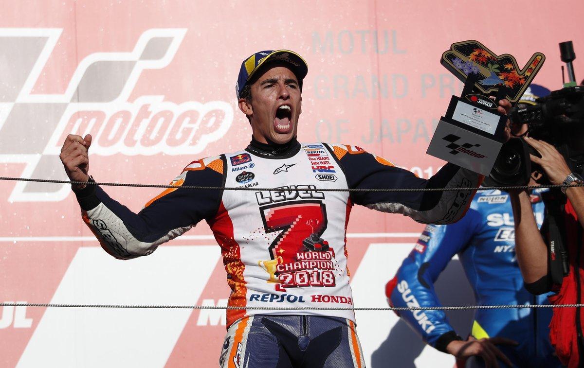 MotoGP - Japanese Grand Prix - Twin Ring Motegi, Motegi, Japan - October 21, 2018 Repsol Honda’s Marc Marquez celebrates winning the MotoGP race and the MotoGP world title on the podium REUTERS/Toru Hanai