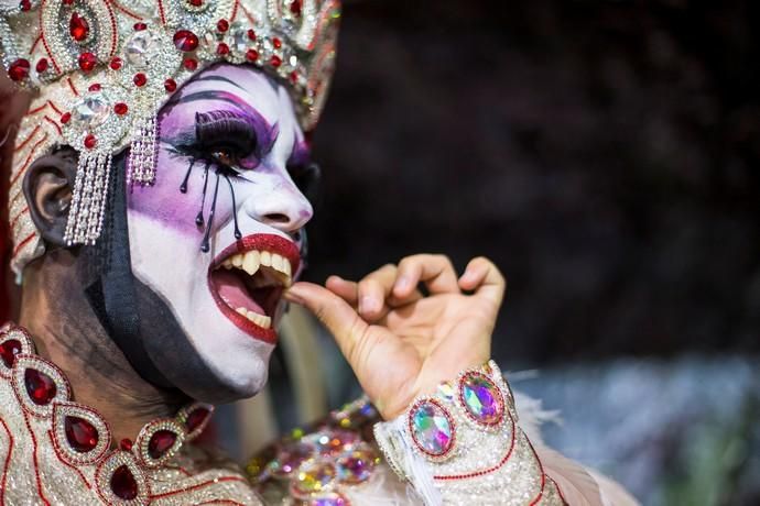 Participant prepares to perform in a drag queen ...