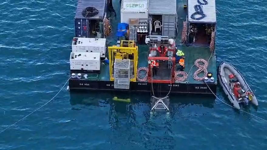 Los buzos ya trabajan en el desagüe de El Grado para reparar las compuertas: así son inmersiones a 50 metros de profundidad